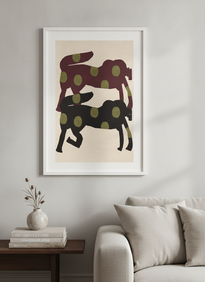 Modern wall art styled above a sofa in a neutral living room