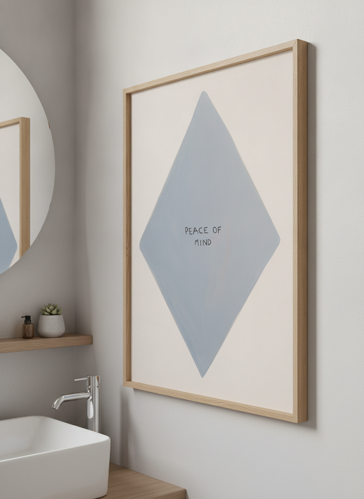 Modern print displayed in a clean minimalist bathroom setting