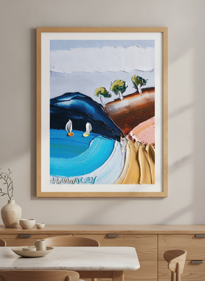 Wall art styled above a dining table in a contemporary home