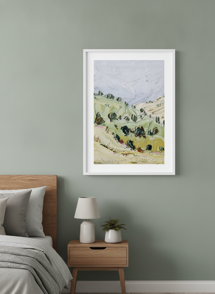 Minimalist artwork displayed in a calm, light-filled bedroom interior
