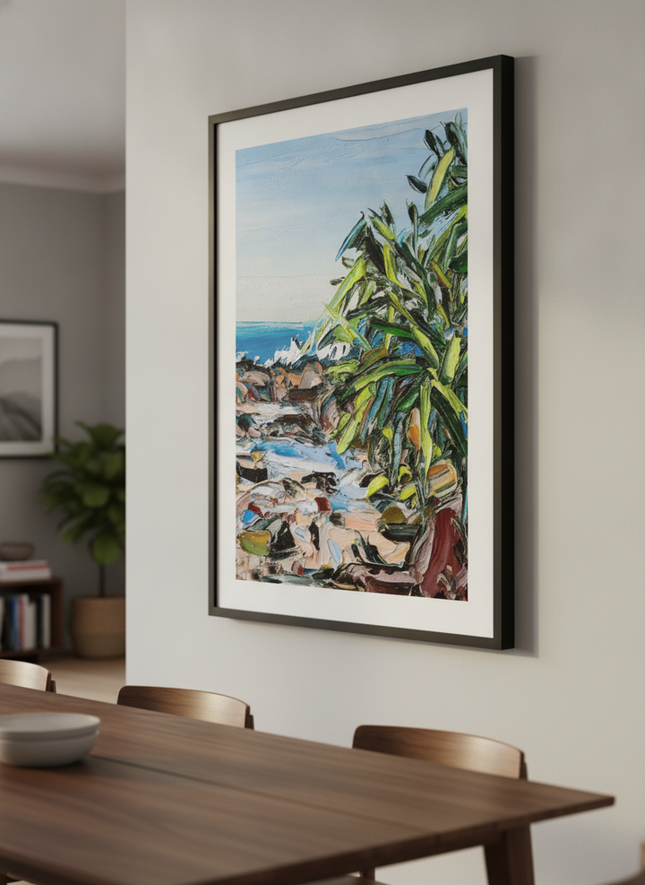 Wall art styled above a dining table in a contemporary home