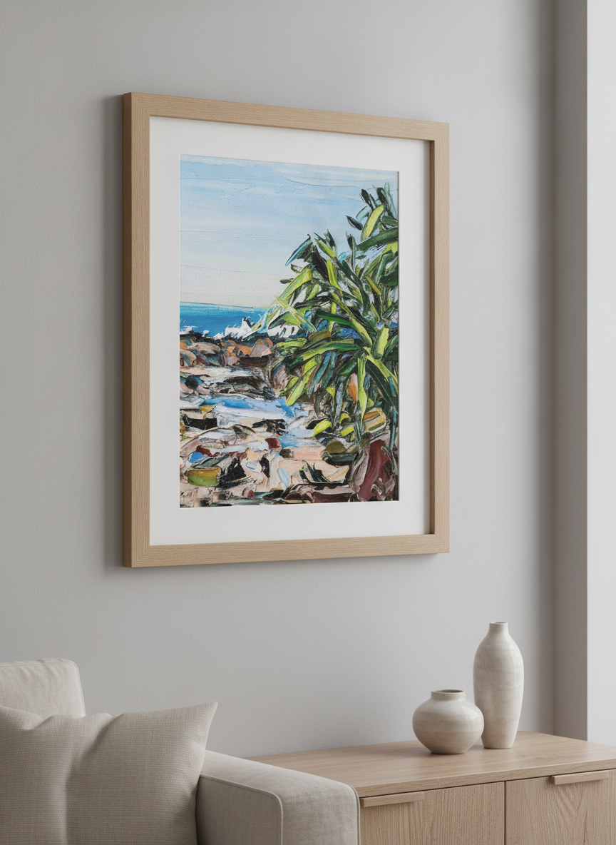 Modern wall art styled above a sofa in a neutral living room