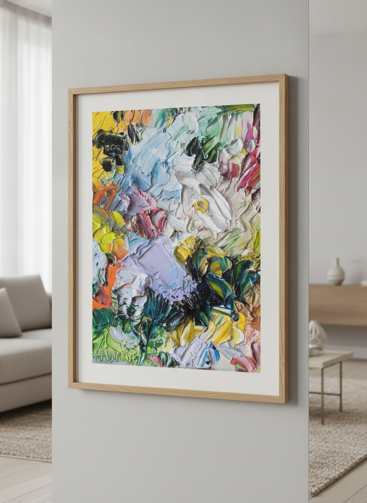 Modern wall art styled above a sofa in a neutral living room