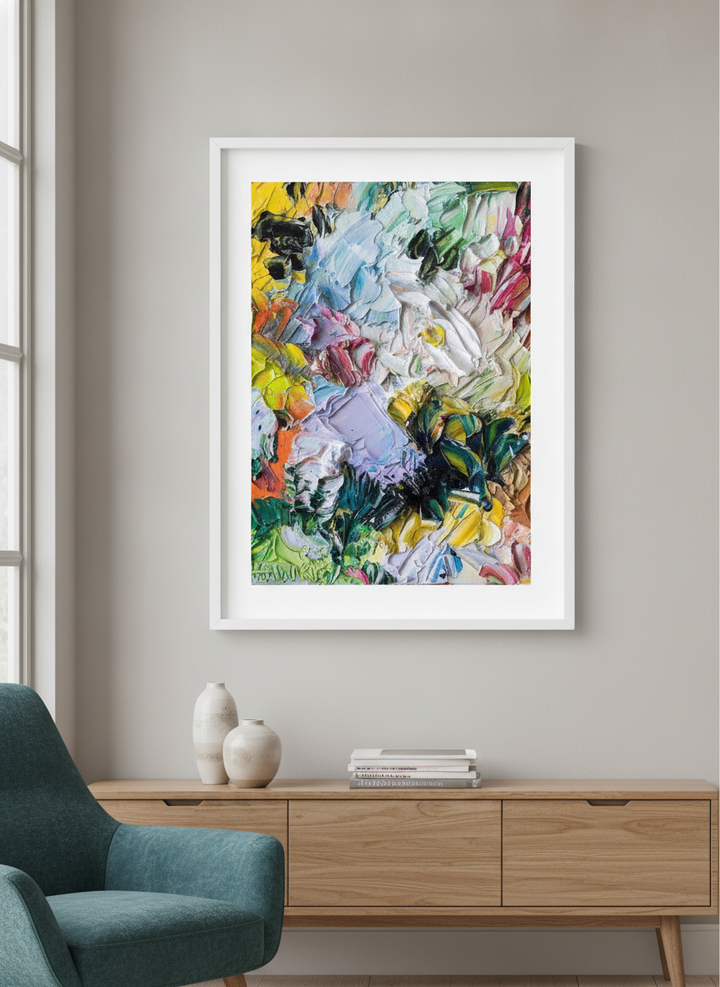 Modern wall art styled above a sofa in a neutral living room