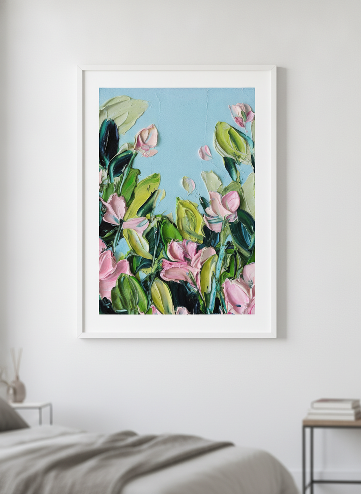 Minimalist artwork displayed in a calm, light-filled bedroom interior