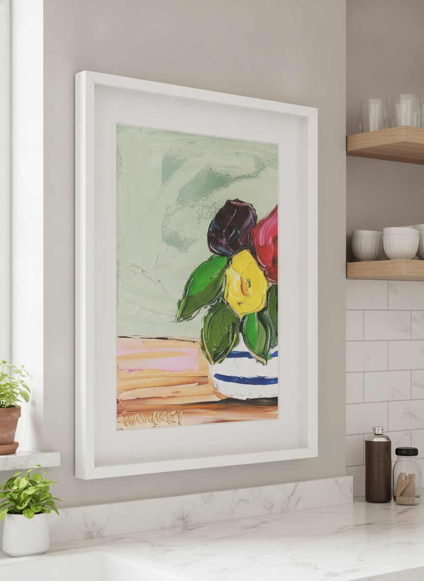 Artwork styled on the wall of a bright modern kitchen