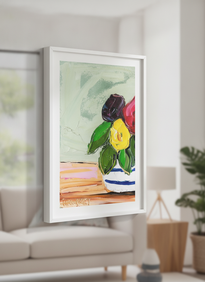 Modern wall art styled above a sofa in a neutral living room