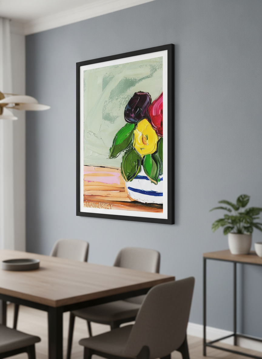 Wall art styled above a dining table in a contemporary home