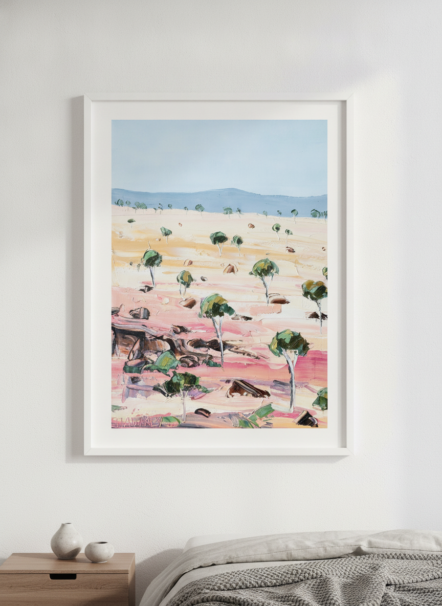 Minimalist artwork displayed in a calm, light-filled bedroom interior