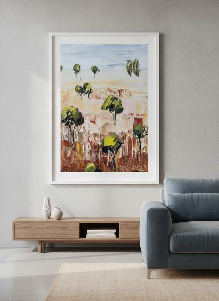 Modern wall art styled above a sofa in a neutral living room