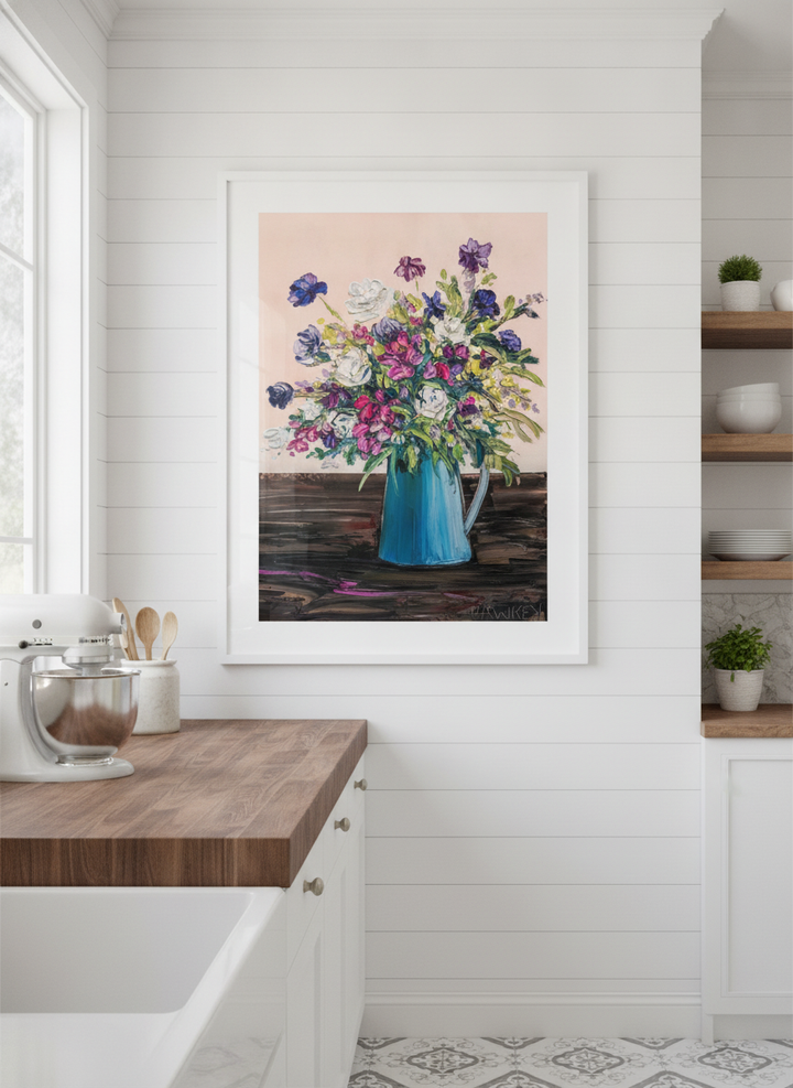 Artwork styled on the wall of a bright modern kitchen