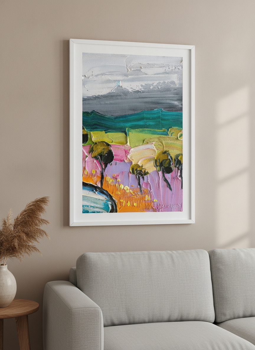 Modern wall art styled above a sofa in a neutral living room