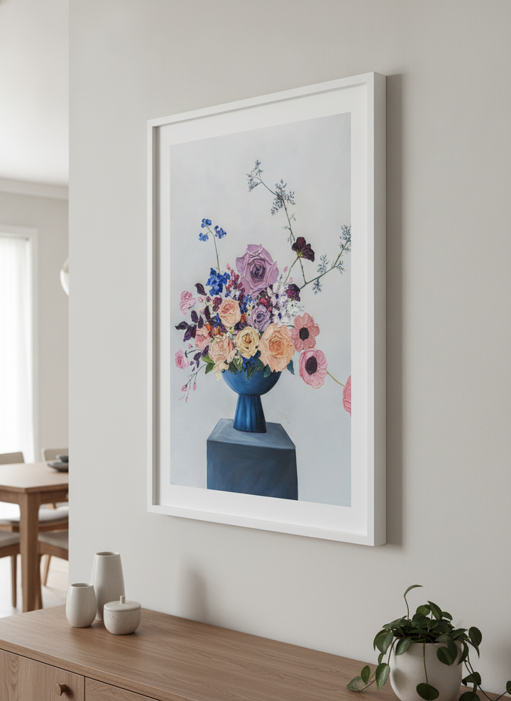 Wall art styled above a dining table in a contemporary home