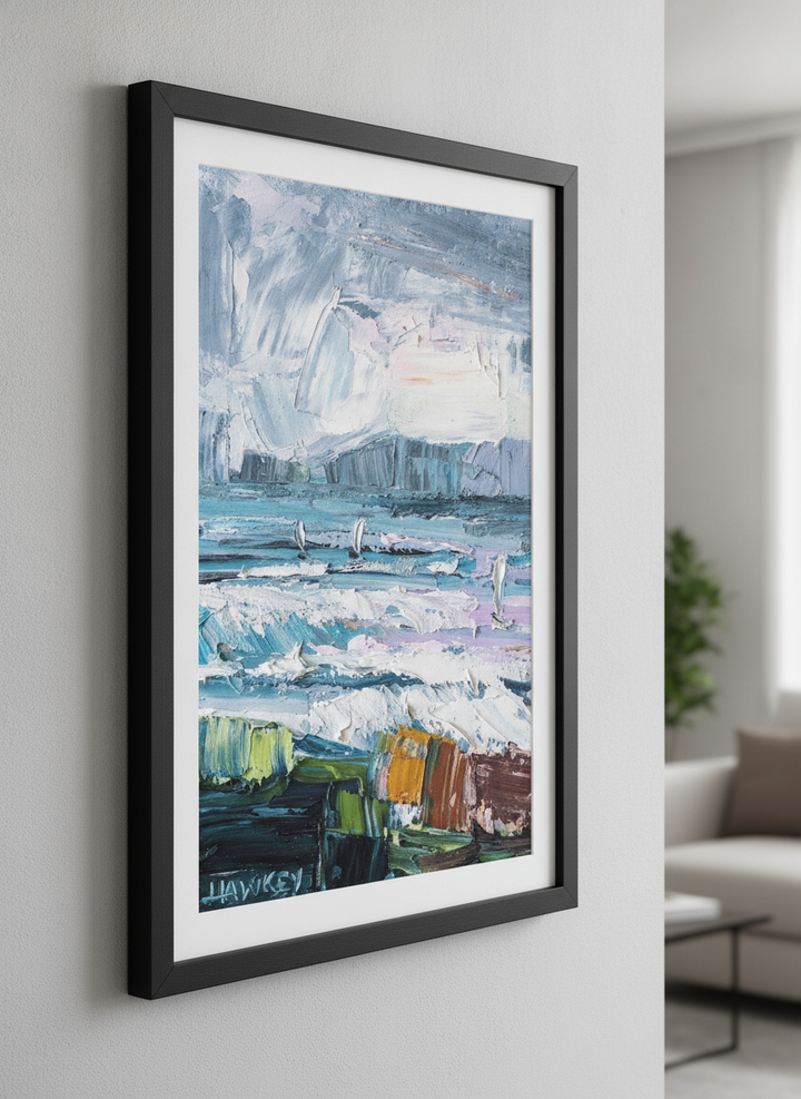Modern wall art styled above a sofa in a neutral living room