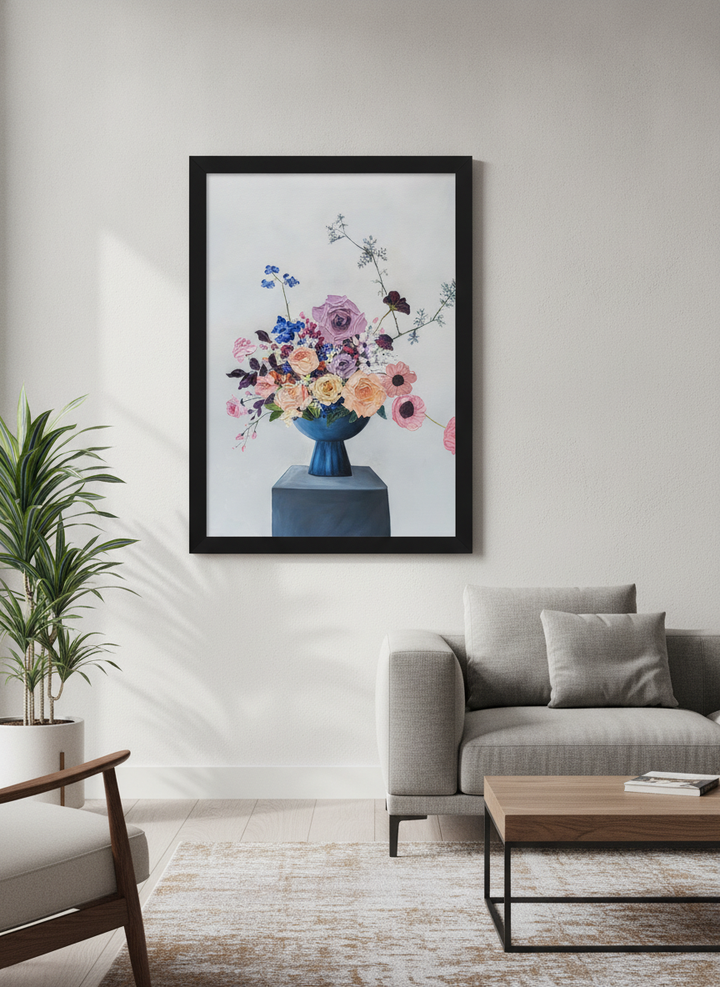 Modern wall art styled above a sofa in a neutral living room