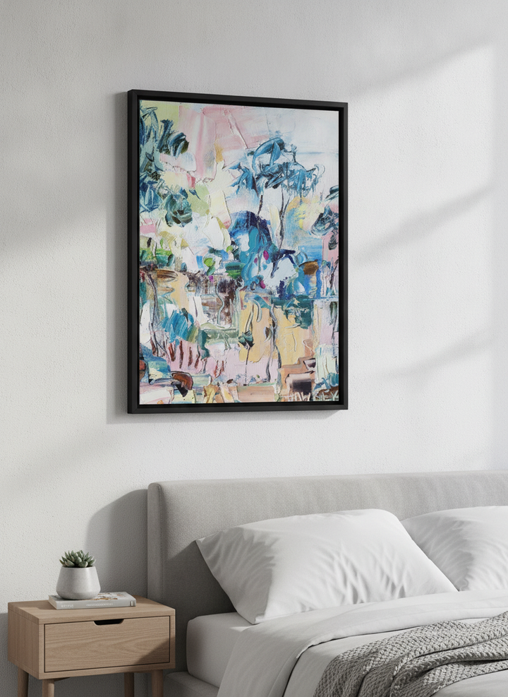 Minimalist artwork displayed in a calm, light-filled bedroom interior
