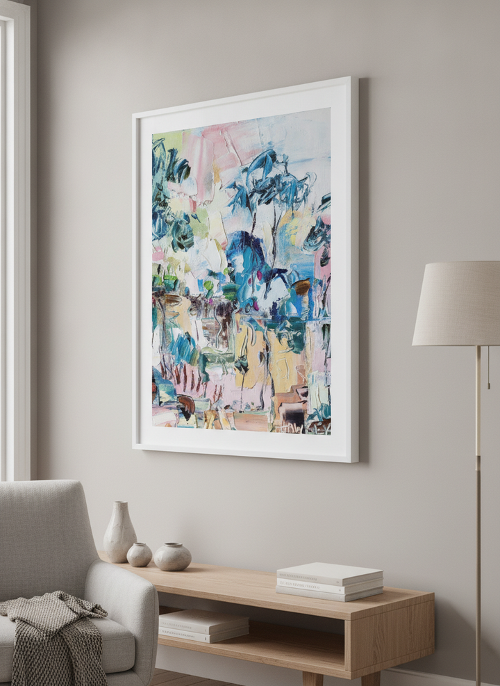Modern wall art styled above a sofa in a neutral living room