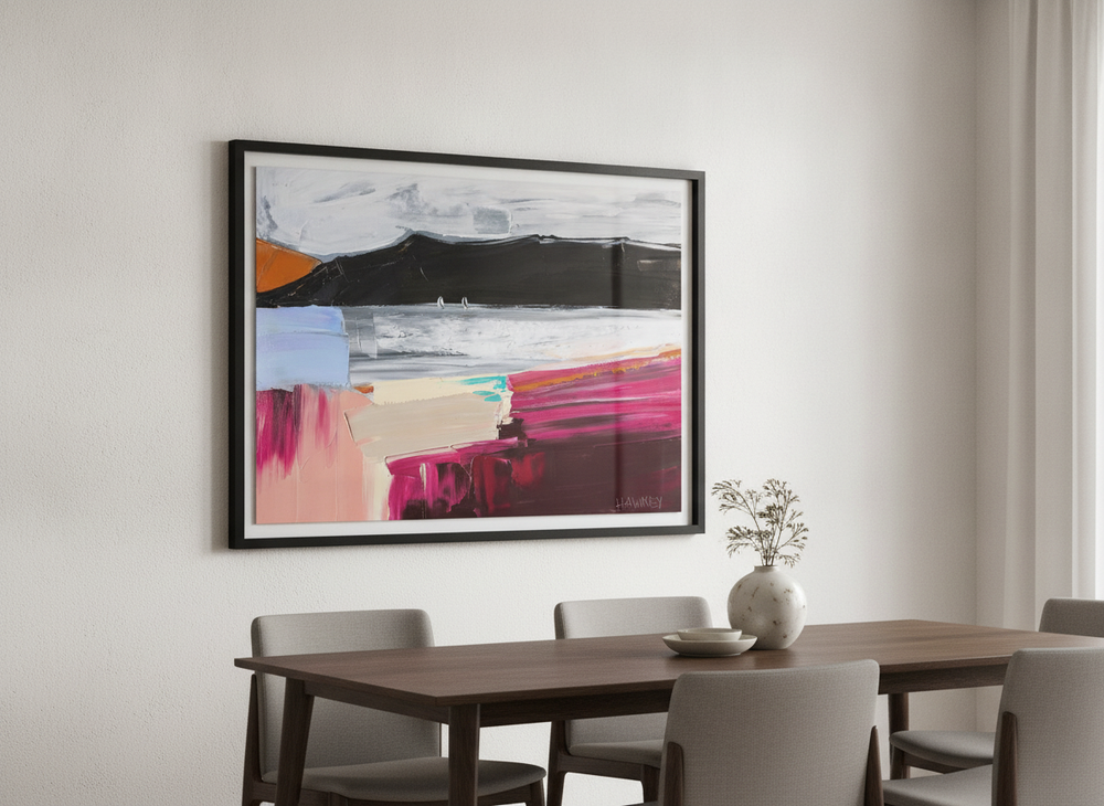 Wall art styled above a dining table in a contemporary home