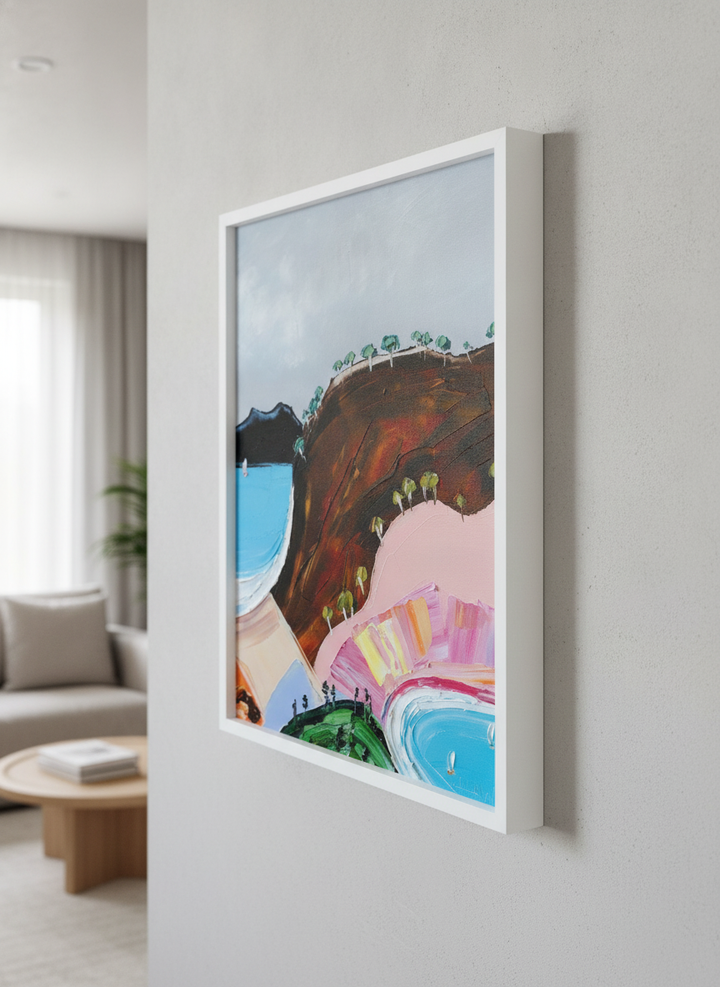 Modern wall art styled above a sofa in a neutral living room