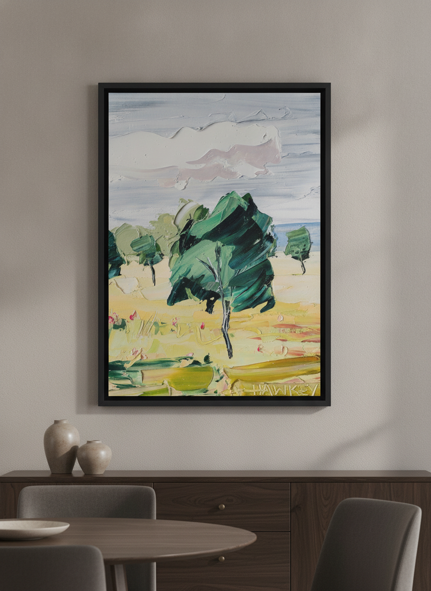 Wall art styled above a dining table in a contemporary home