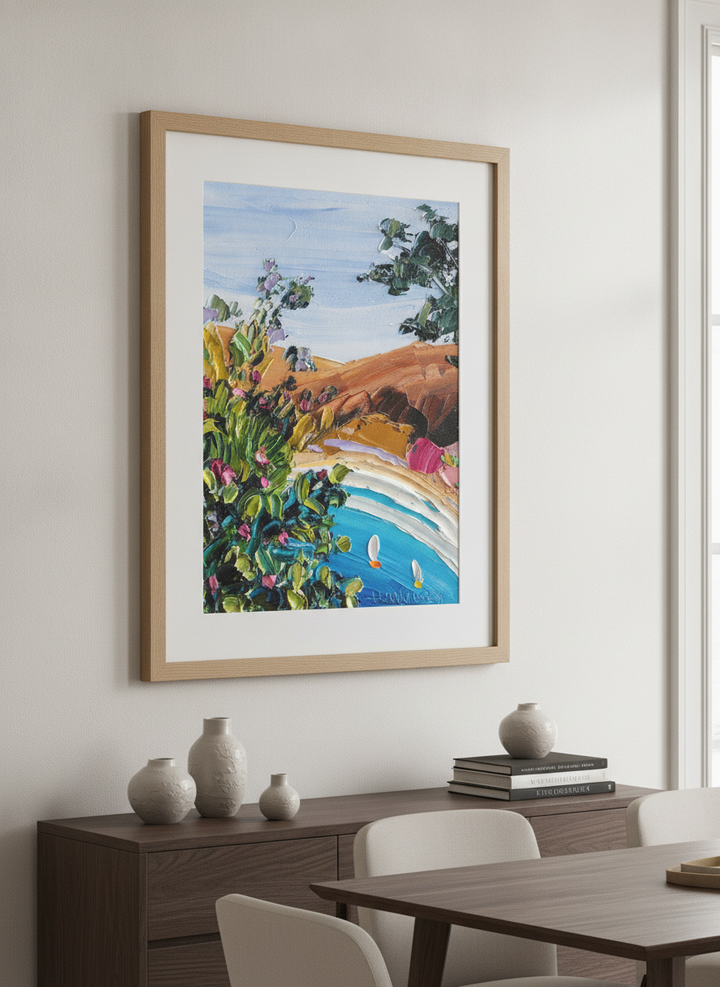 Wall art styled above a dining table in a contemporary home