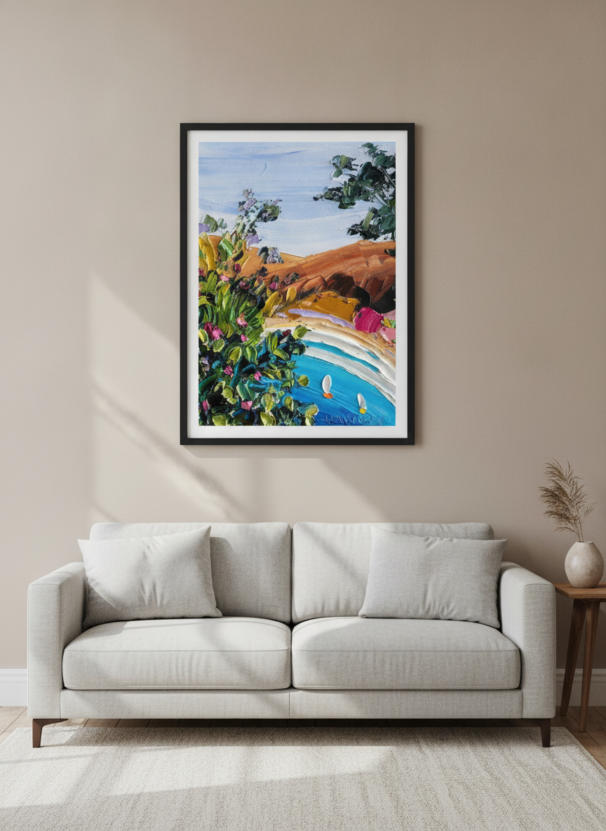 Modern wall art styled above a sofa in a neutral living room
