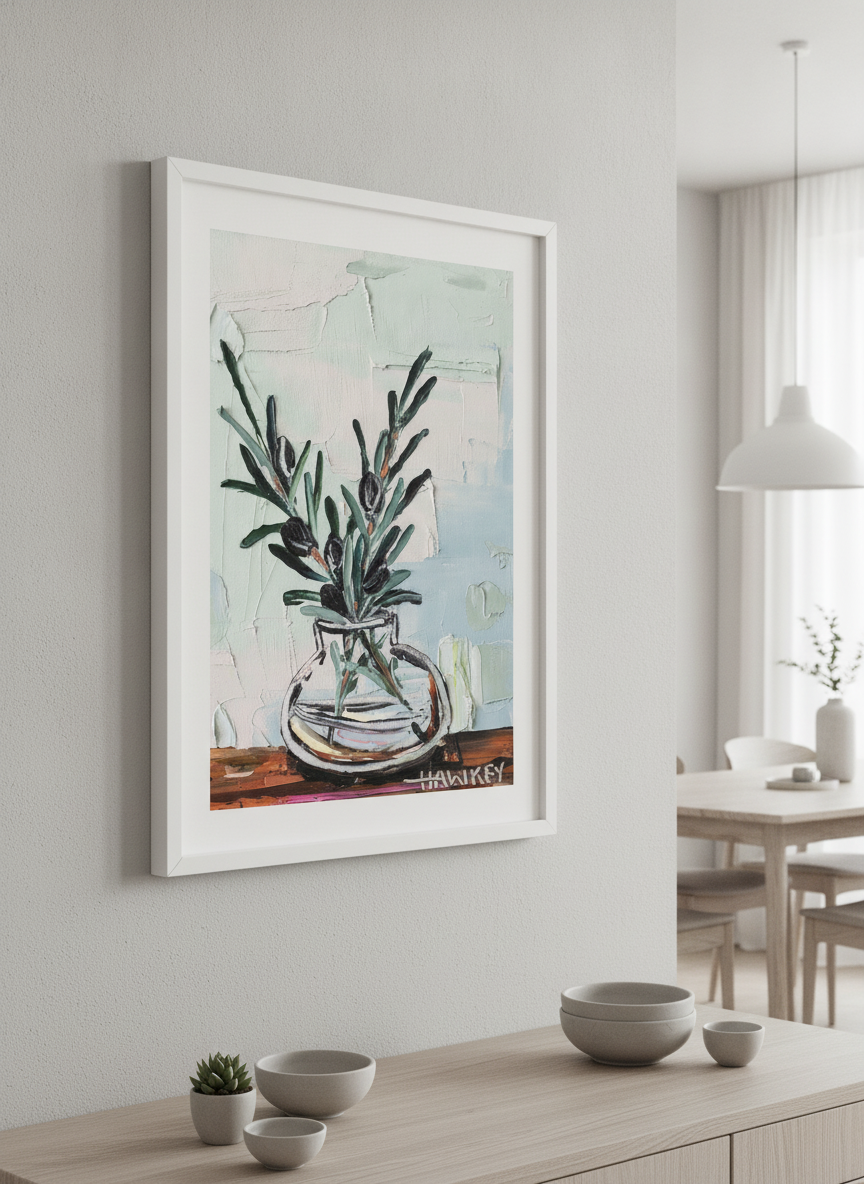 Wall art styled above a dining table in a contemporary home