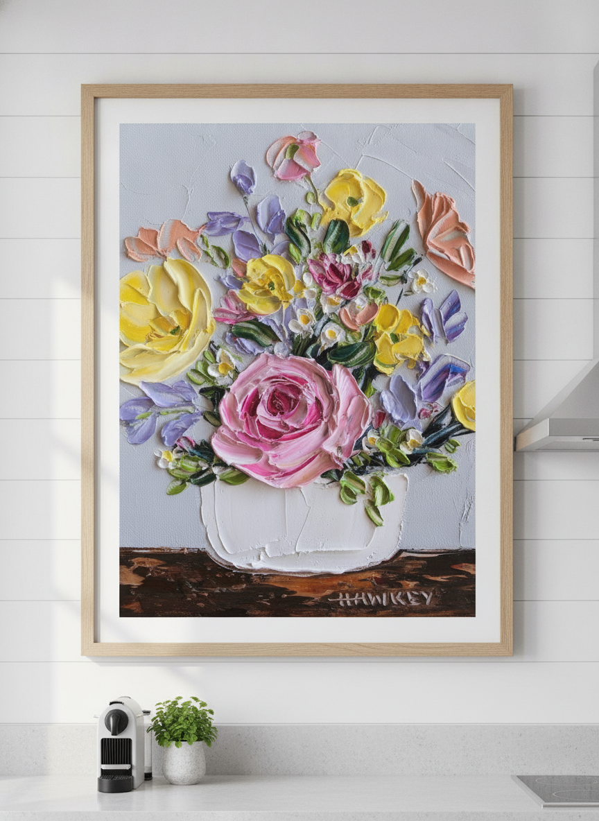 Artwork styled on the wall of a bright modern kitchen