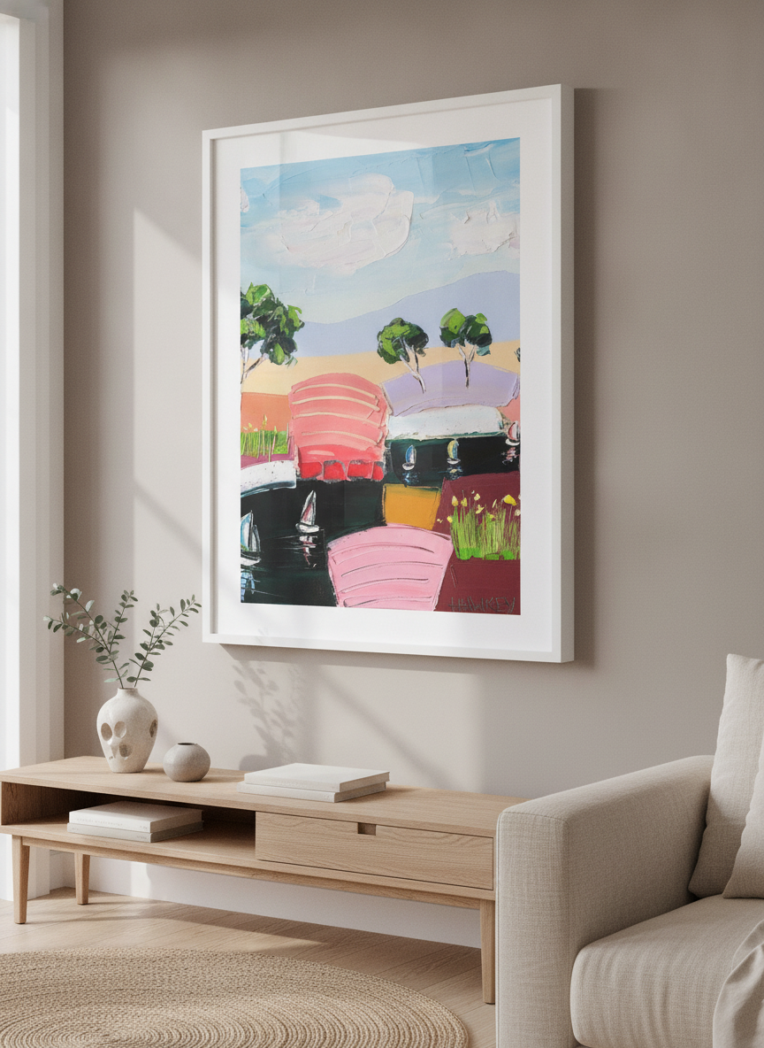 Modern wall art styled above a sofa in a neutral living room