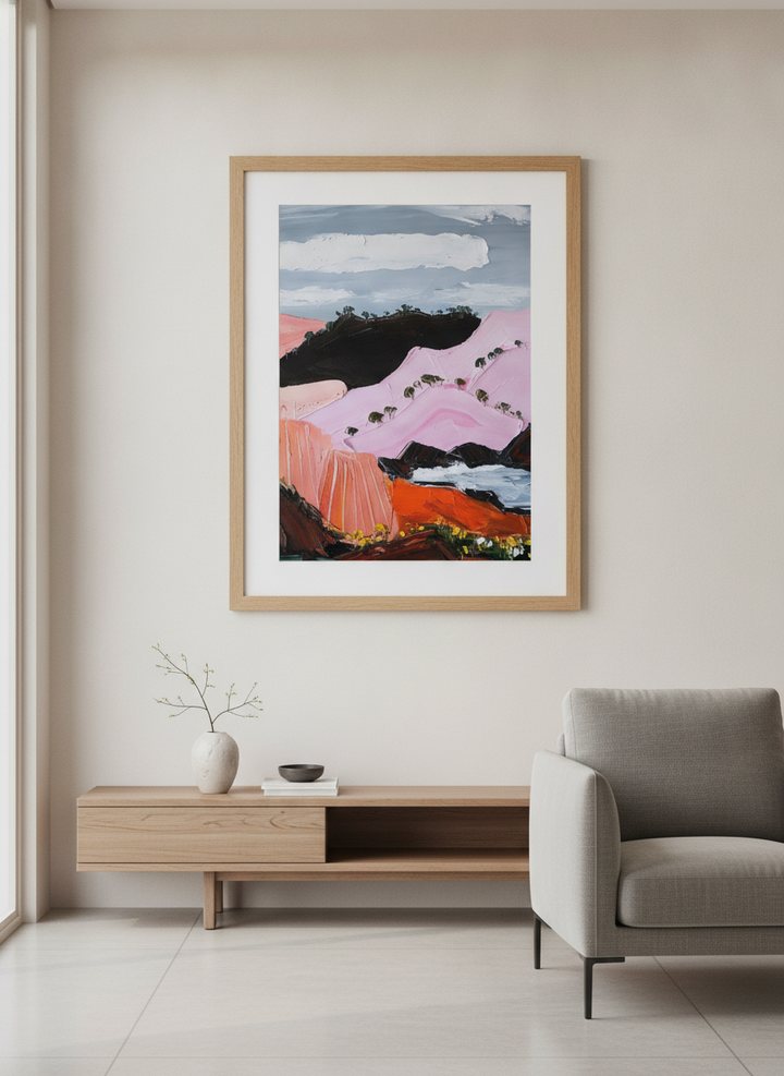 Modern wall art styled above a sofa in a neutral living room