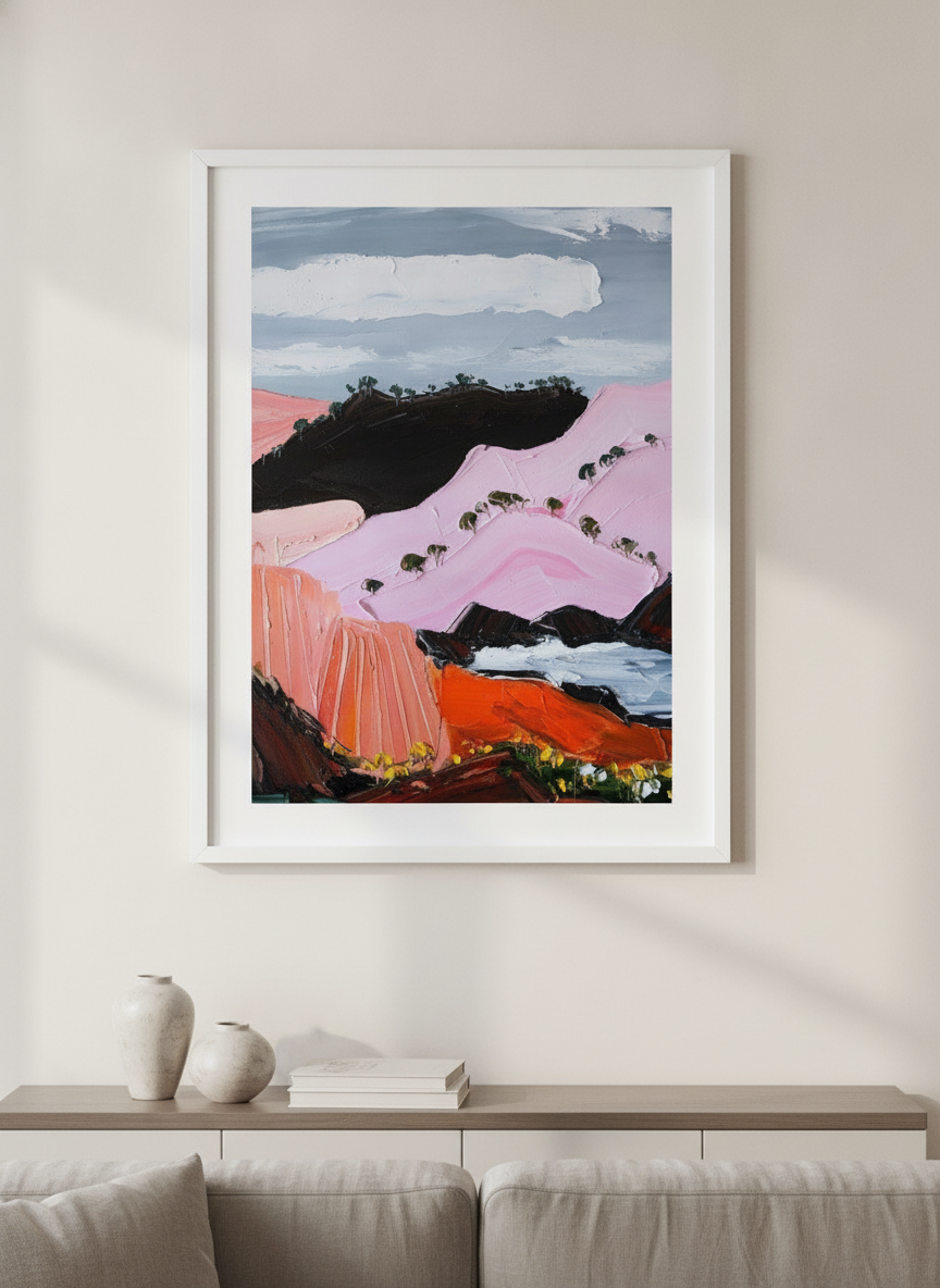 Modern wall art styled above a sofa in a neutral living room