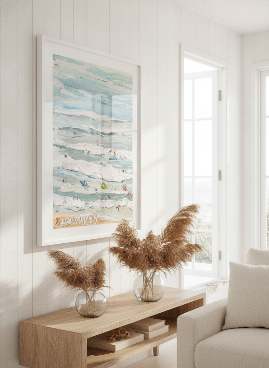 Neutral wall art displayed in a sunny coastal beach house