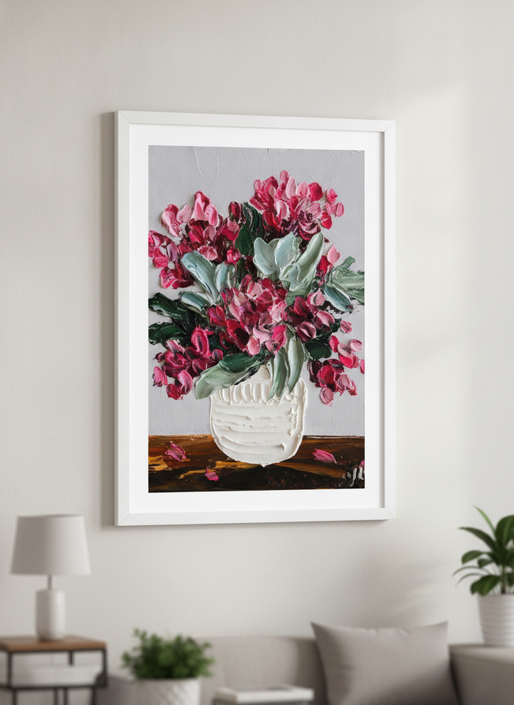 Modern wall art styled above a sofa in a neutral living room