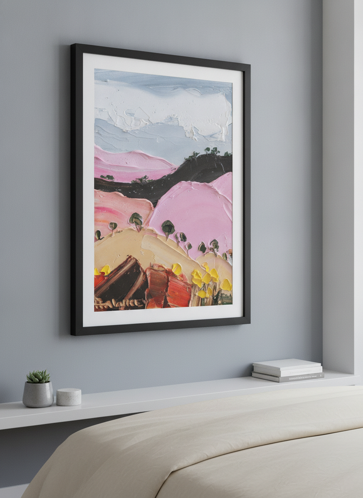 Minimalist artwork displayed in a calm, light-filled bedroom interior