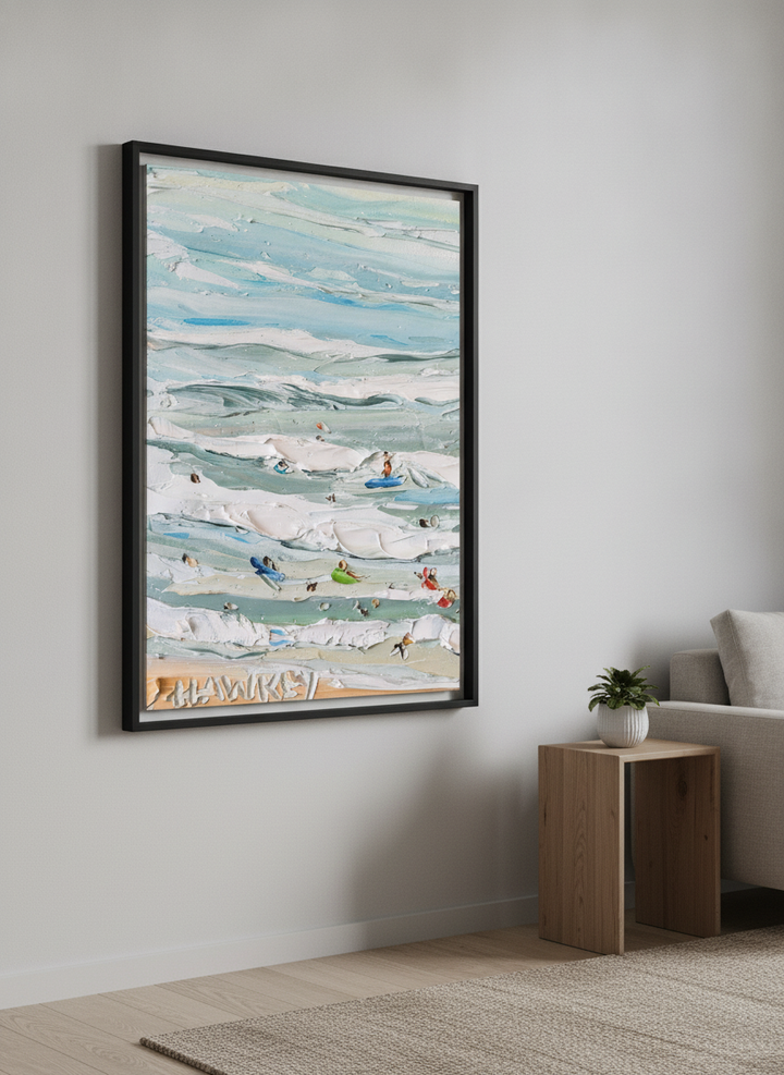 Modern wall art styled above a sofa in a neutral living room