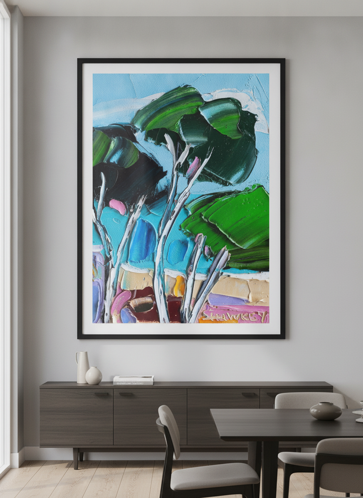 Wall art styled above a dining table in a contemporary home