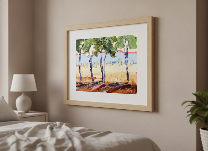 Minimalist artwork displayed in a calm, light-filled bedroom interior