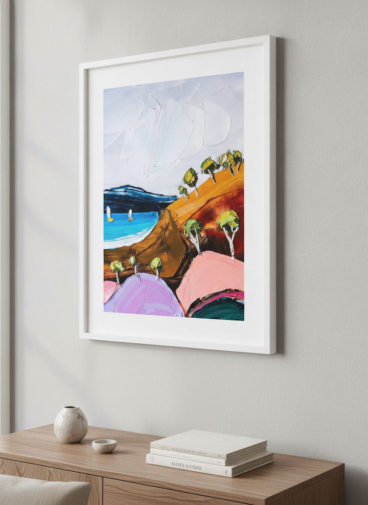 Modern wall art styled above a sofa in a neutral living room
