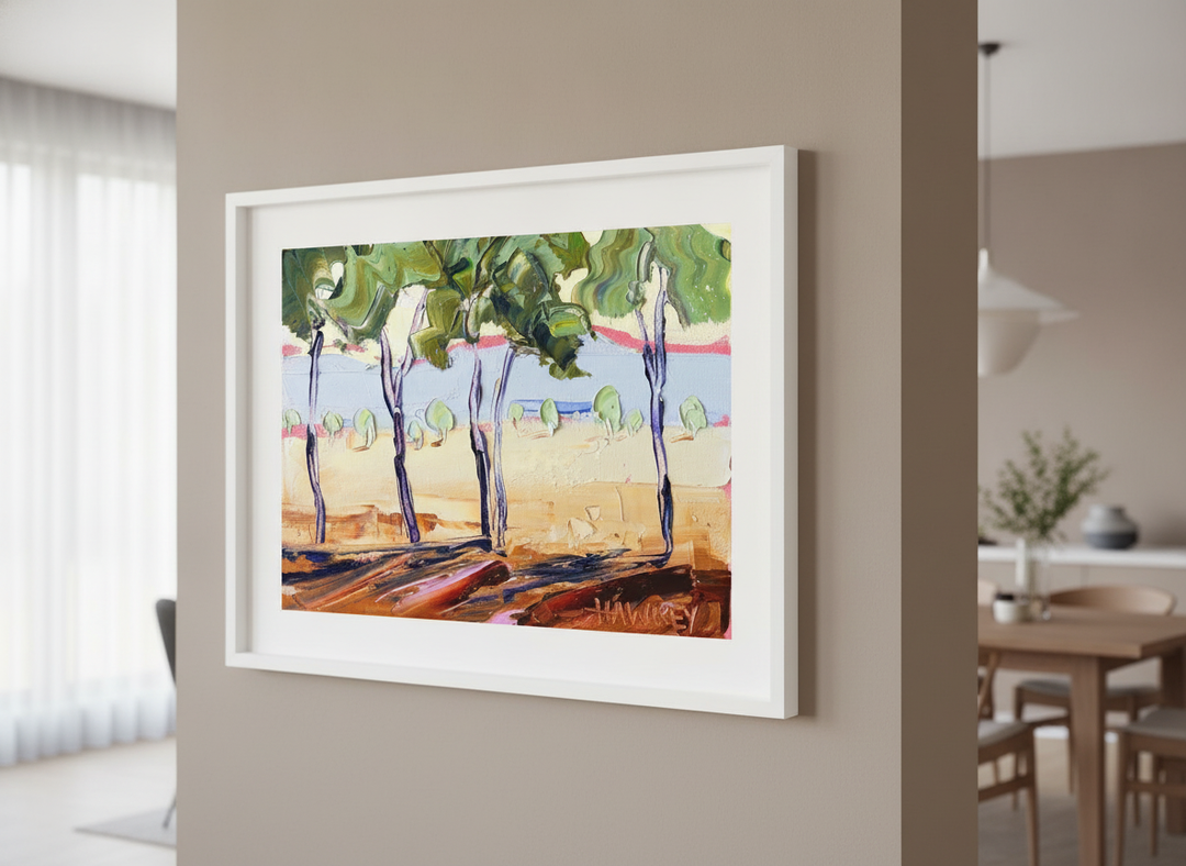 Wall art styled above a dining table in a contemporary home
