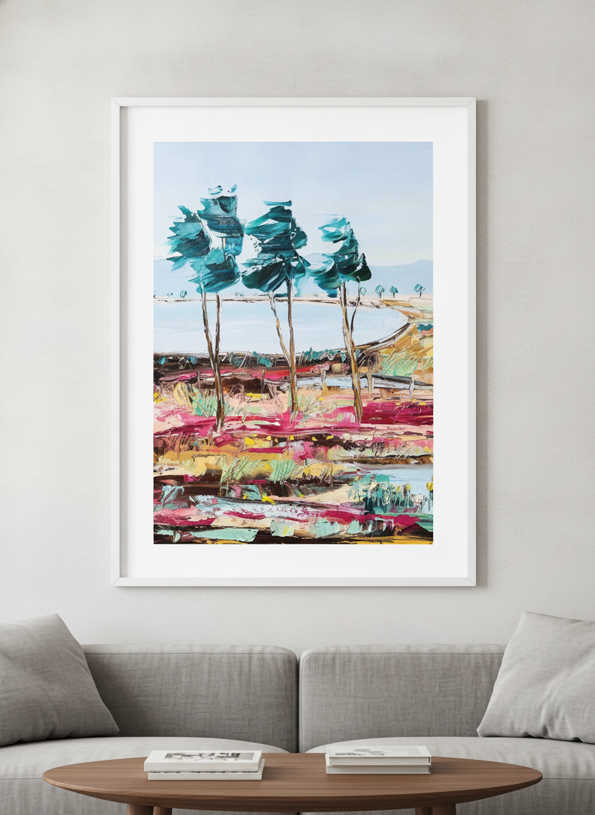 Modern wall art styled above a sofa in a neutral living room