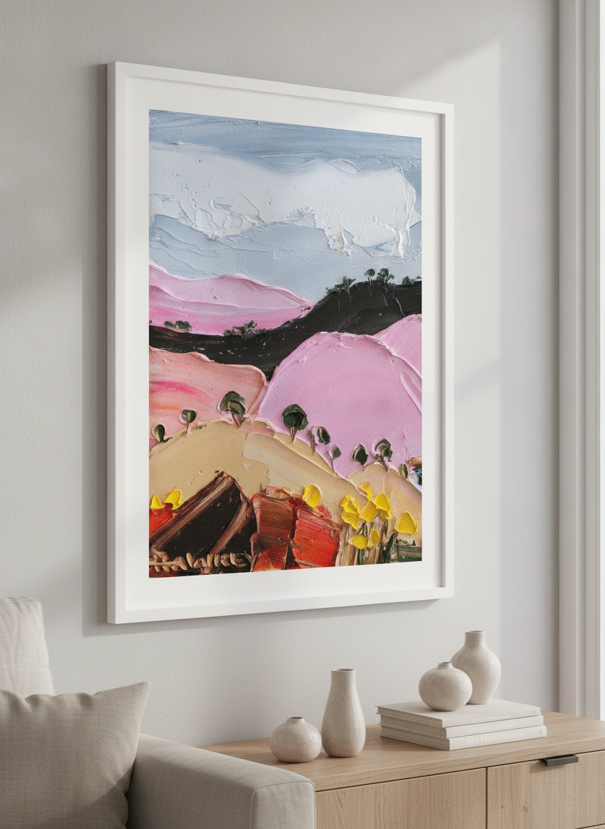 Modern wall art styled above a sofa in a neutral living room