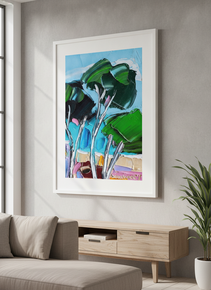 Modern wall art styled above a sofa in a neutral living room