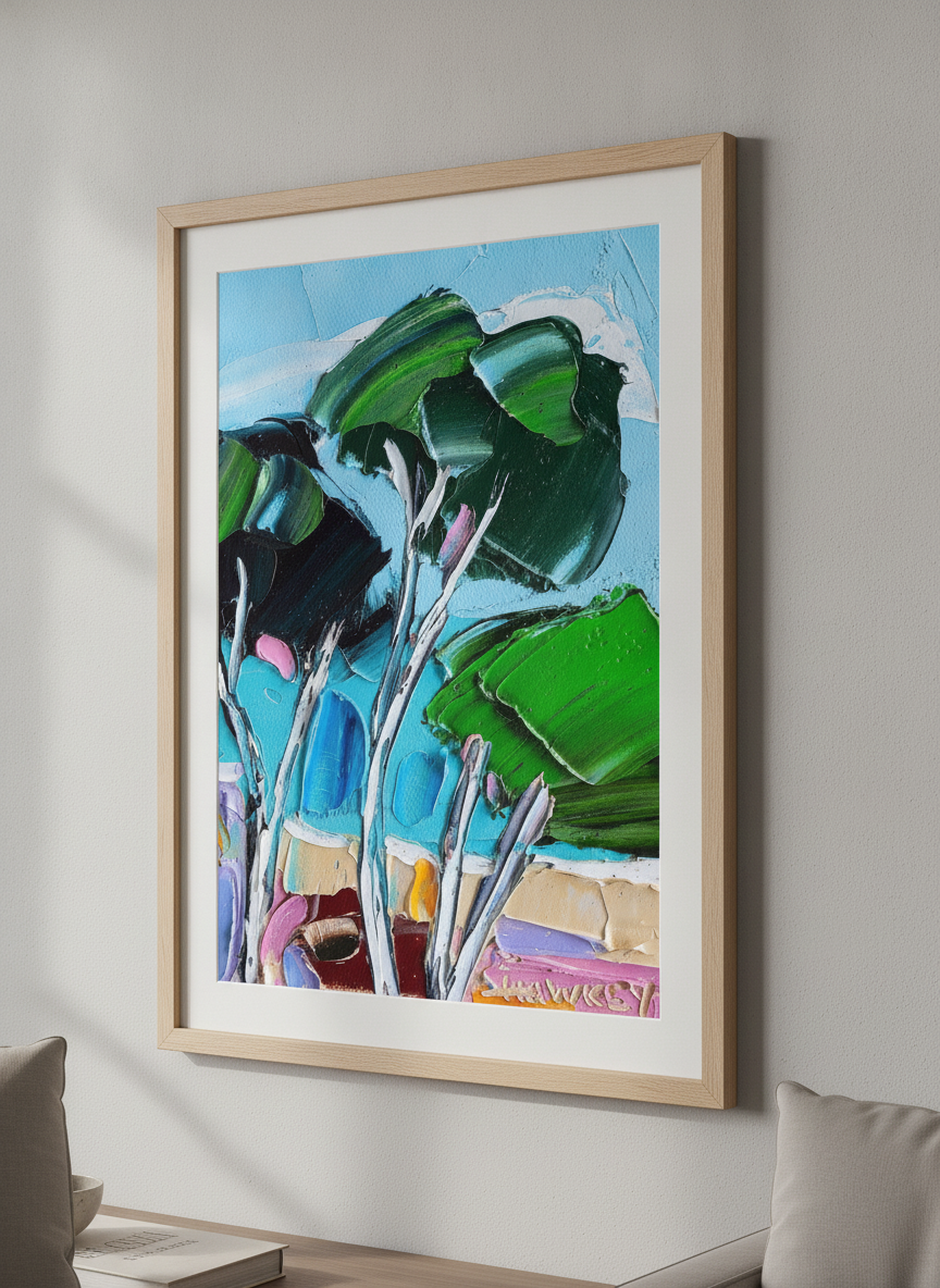 Modern wall art styled above a sofa in a neutral living room