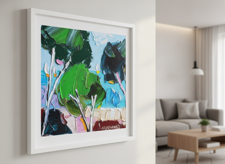 Modern wall art styled above a sofa in a neutral living room