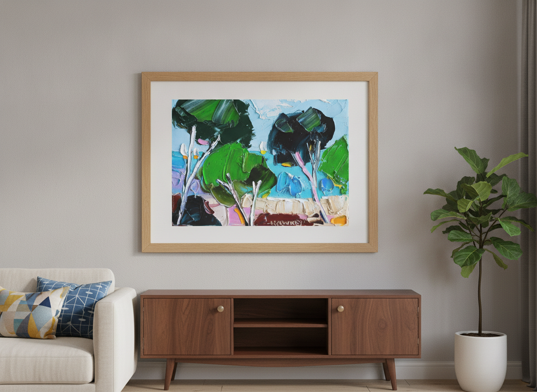Modern wall art styled above a sofa in a neutral living room