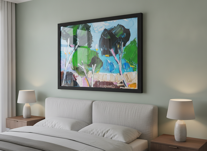 Minimalist artwork displayed in a calm, light-filled bedroom interior
