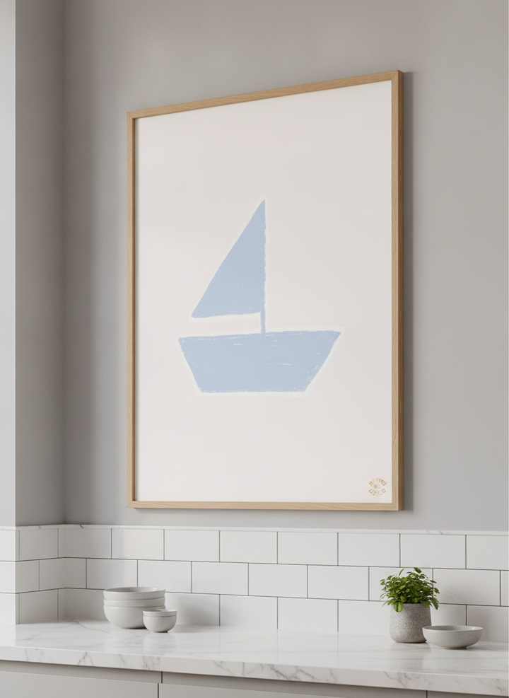 Artwork styled on the wall of a bright modern kitchen