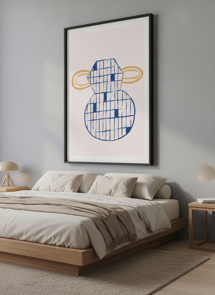 Minimalist artwork displayed in a calm, light-filled bedroom interior