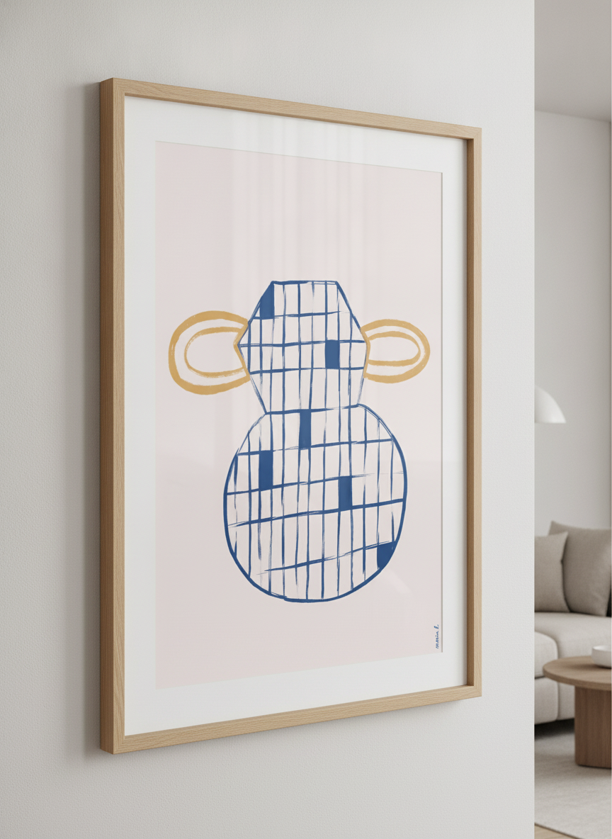 Modern wall art styled above a sofa in a neutral living room