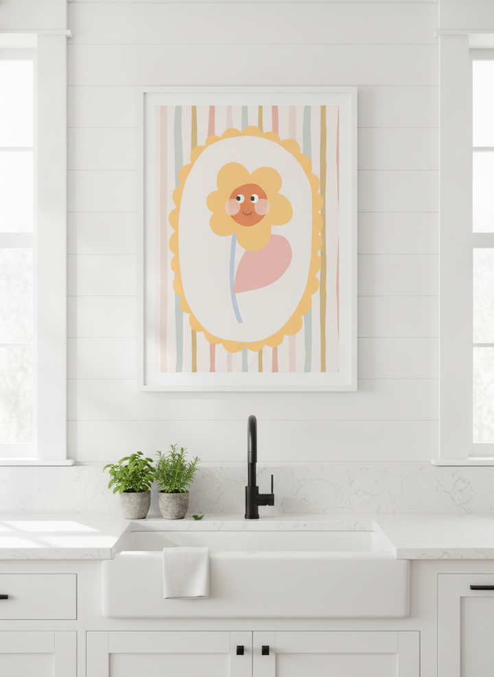 Artwork styled on the wall of a bright modern kitchen